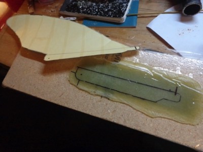  3/7/16 - The base of the removable fin is made from several layers of fiberglass cloth. 