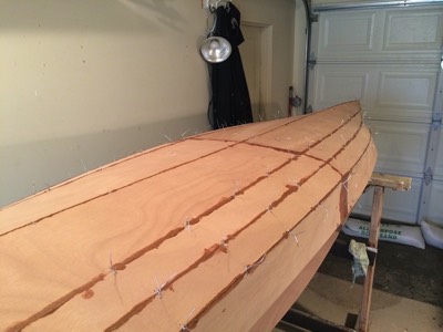  4/13/14 - The hull seams are glued with epoxy.   