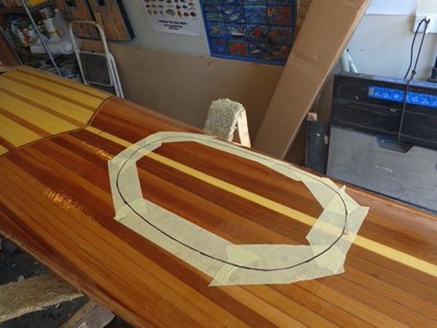  The outline for the forward hatch is traced on the deck. 