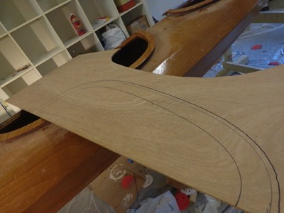  7/13/17 -  The shape of a custom center cockpit hatch is traced onto  wood. 