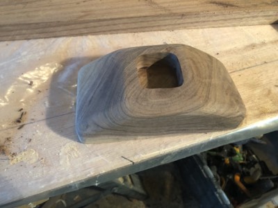  Mast step is shaped from a piece of walnut. 