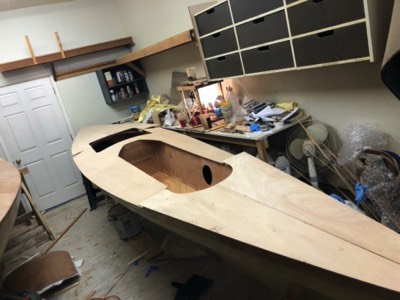  3/12/18 - The deck panels are placed on the hull after given a fill coat of epoxy on the underside. 