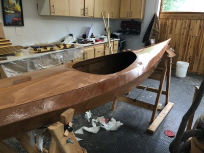  2/12/19 - The overhanging cloth is trimmed and a fill coat of epoxy is applied. 