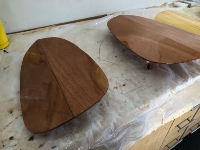  Several coats of varnish are applied to the hatch covers. 