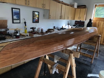  2/26/19 - Sanding dust is washed off the hull. 