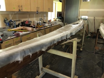  4/13/20 - Fiberglass cloth is laid on the deck. 