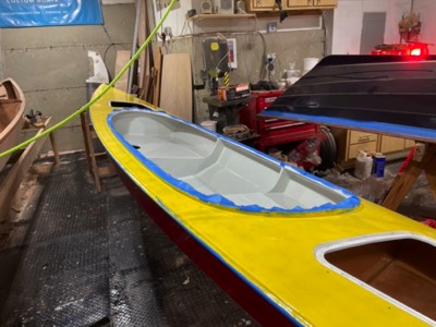  First coat of yellow on the deck and Seattle grey in the cockpit.  