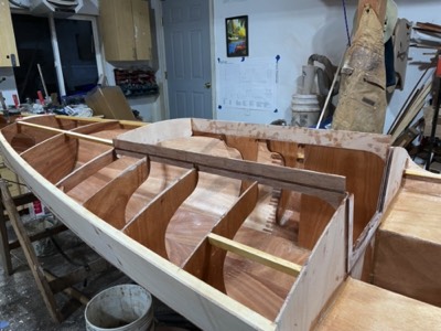  The companionway hatch surround is epoxied in place. 