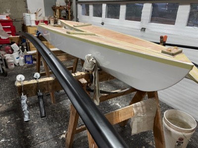  2/20/23 - The amas are taped for deck paint and the akas are given the final coat of satin paint.  