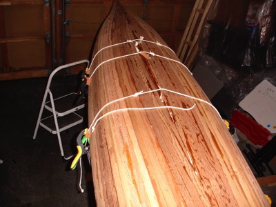  The final strip is placed in the hull. 