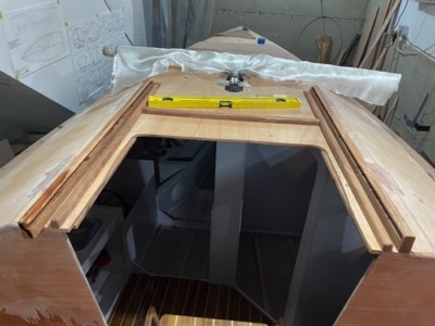  Companionway hatch slides are test fit. 