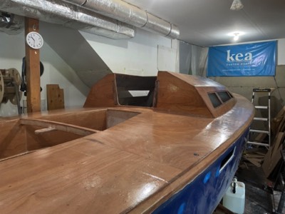  8/12/21 - The deck and cabintop are given several fill coats of epoxy. 