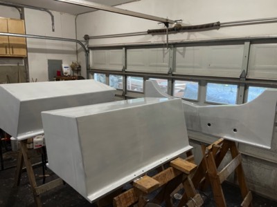  8/24/21 - Trailer bunks are given first coat of paint. 