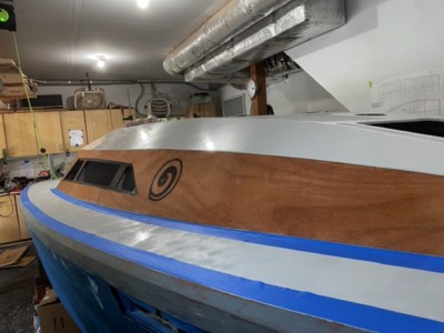  Deck is taped off for final hull paint and varnish on #1 panel. 