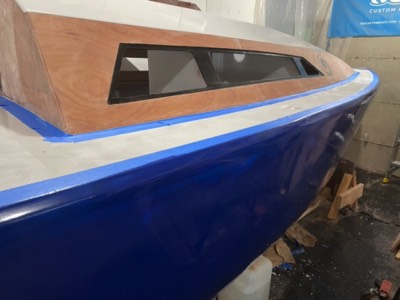  First coat of hull paint. 