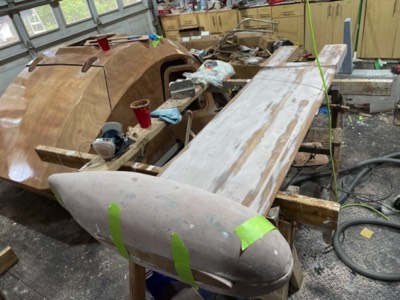  4/21/22 - The keel is sanded and the styrofoam lead bulb mold is test fit.  