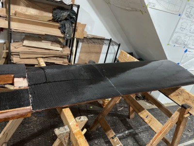  4/28/22 - Starboard side of the keel foil is covered with carbon fiber. 