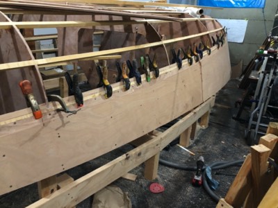 9/23/20 - The starboard side hull panels are epoxied and screwed in place. 