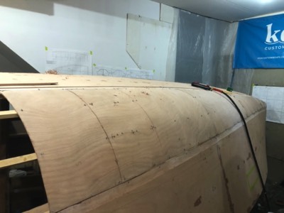  10/14/20 - The first layer of radius panels are test fit on the port side. 