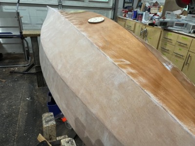  10/15/21 - The hull is half sanded. 
