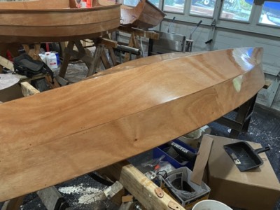  10/20/21 - Several coats of varnish have been applied to the hull. 