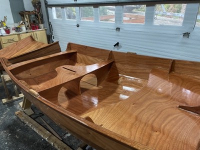  4/15/23 - First coat of varnish is applied to the interior. 