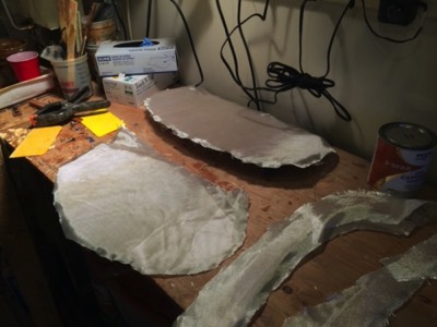  10/19/14 - The bulkheads and hatch lips are prepped for fiberglassing on one side. 