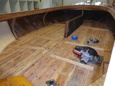  The floorboards are temporarily put back in the boat.  