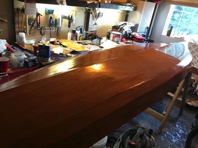  9/25/17 - The third coat of varnish is applied to the hull. 