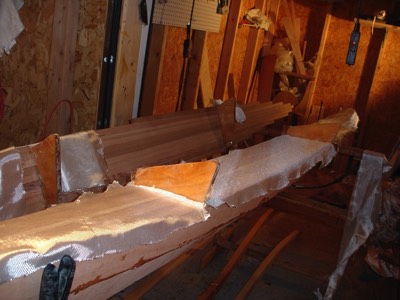  Fiberglass cloth is laid out on the decks of the amas. 