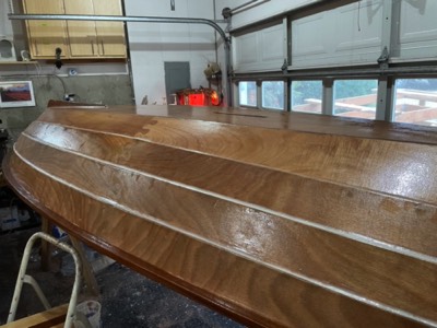  12/1/21 - A seal coal of epoxy is applied to the hull.  