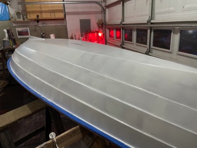 1/1/22 - The first coat of primer is applied to the hull. 