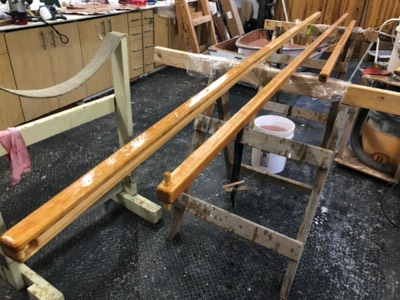  12/6/19 - The first seal coat of epoxy is applied to the spars. 