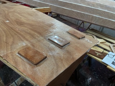  12/8/21 - Reinforcement blocks are epoxied onto the underside of the deck. 