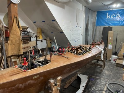  3/15/23 - Stiffeners are epoxied to the underside of the hatch openings.  