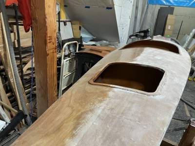  4/12/23 - Half of the deck is sanded in preparation for painting. 